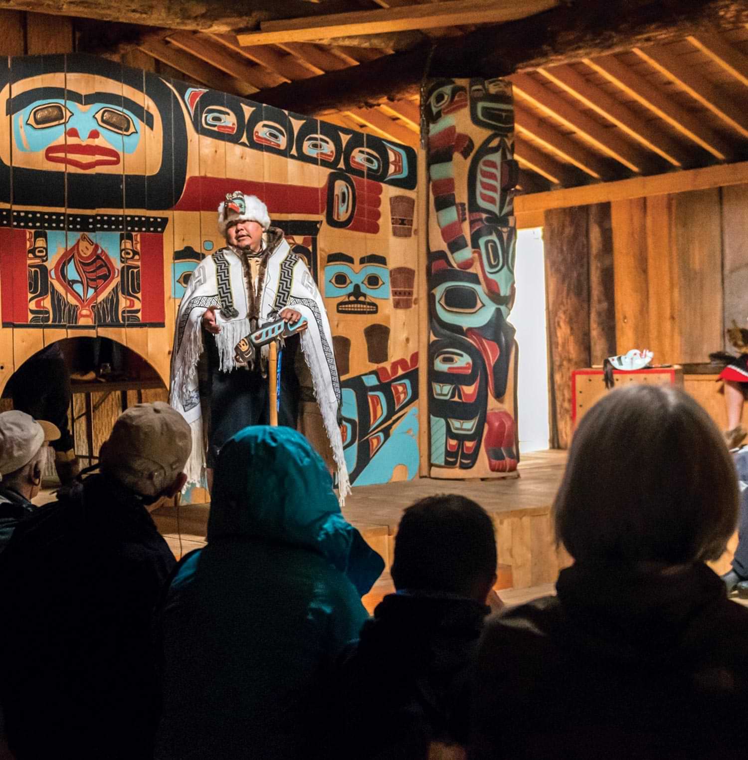 cultural tourists enjoy a presentation on Tlingit heritage at the Jilkaat Kwaan Heritage Center at Klukwan