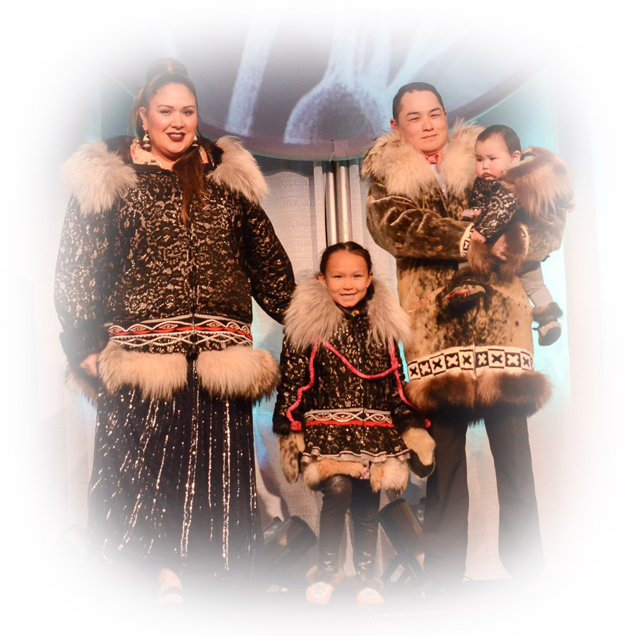 Alaskan Native family on stage
